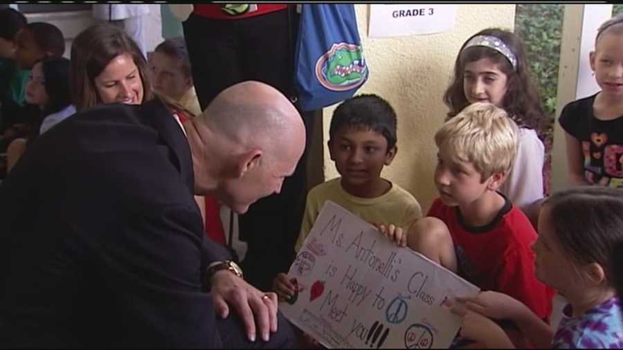 Gov. Rick Scott visits with students at S.D. Spady Elementary School in Delray Beach.
