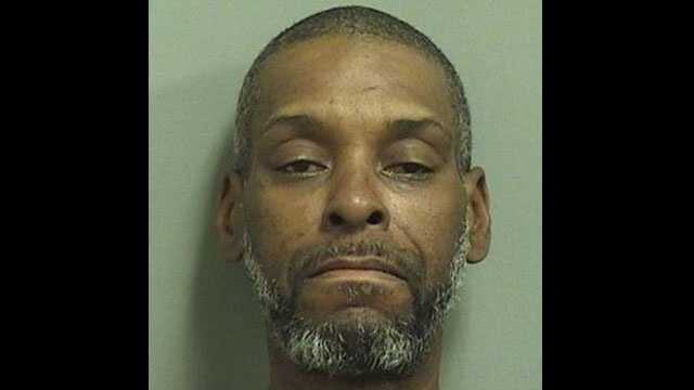 Daryl Lewis is accused of attacking a woman outside a CVS pharmacy in Boca Raton.