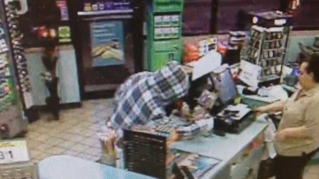 Police say this man got away with $50 during a robbery at a Cumberland Farms in Port St. Lucie.
