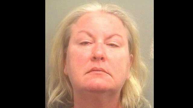 Heather Watt is accused of entering her neighbor's home and pulling a gun on him and his friends for listening to music too loud.