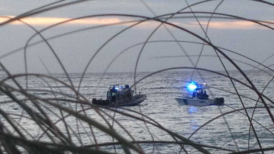 Authorities search for a missing swimmer in the Boynton Beach inlet.