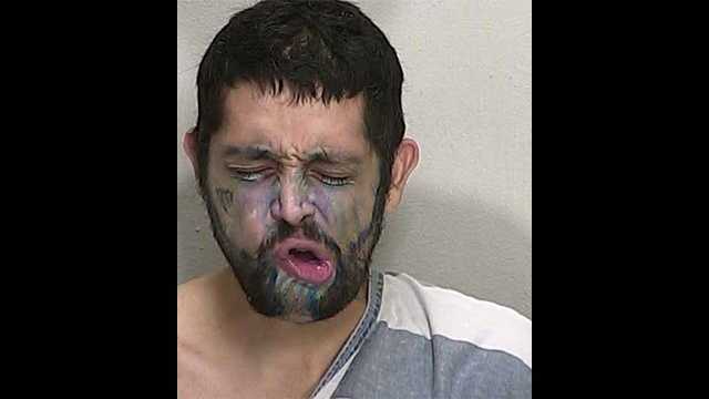 Anthony Cifuentes was arrested while wearing blue face paint in Marion County on Friday.