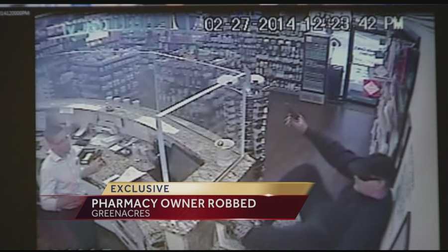 A man with a gun busted into a pharmacy and robbed it, and it was all caught on video.