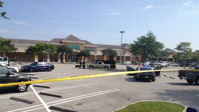 Man found dead from gunshot wound in car in Publix parking lot