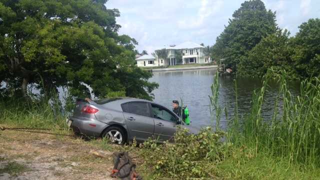 MAY 27: Two people were rushed to a hospital after the car they were in plunged into a canal in Delray Beach on Tuesday.
