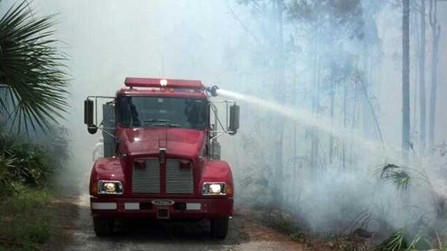 Officials on Wednesday evacuated portions of northern St. Lucie County because of a brush fire.