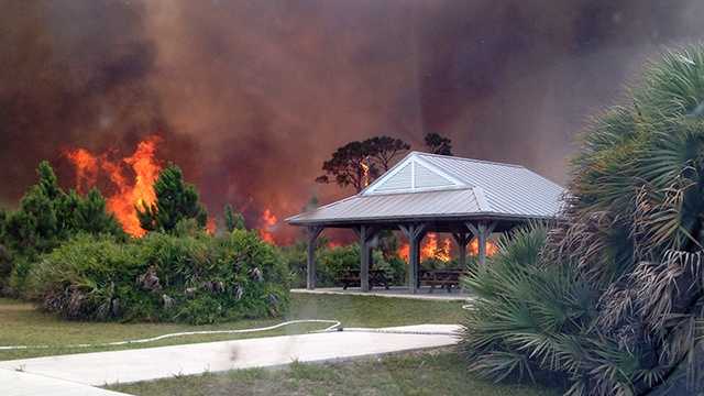 JUNE 11: An out-of-control brush fire is causing problems on the Treasure Coast on Wednesday.