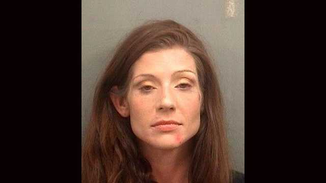 Candice Kelly was arrested and is facing charges of grand auto theft, retail grand theft, and fleeing and resisting arrest after she jumped into and stole a police car to avoid custody, according to Boynton Beach police report. 