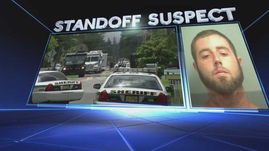 The sister of Kyle Smith, the man accused of a four-hour standoff with Palm Beach County Sheriff's deputies Monday, spoke to WPBF 25 News in an exclusive interview about what happened during the incident and how she miraculously was able to survive the five shots he fired at her.