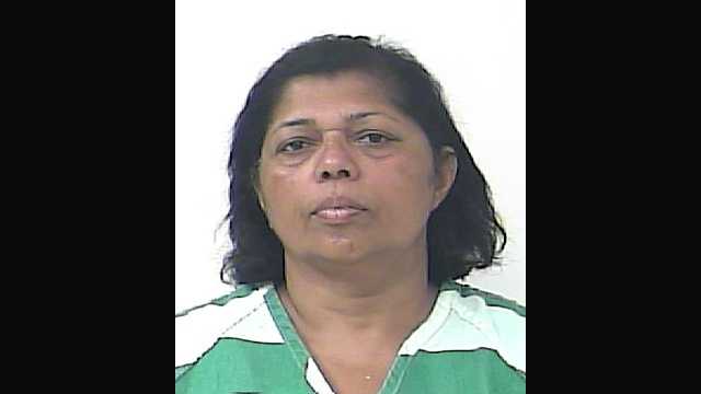 Bisai Indrawatie, 55, was arrested and is facing charges of grand theft and contributing to the delinquency of a minor, after she used her 13-year-old grandson to help her shoplift from a Walmart store, according to Port St. Lucie police. 