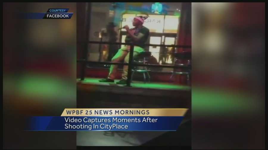 Police continue to search for the person that opened fire at CityPlace in West Palm Beach on Saturday night, sending a teen to the hospital. Cellphone video captured some of the aftermath after the shots were fired.