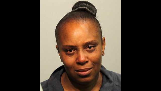 Tojuana Lowe is facing a child cruelty charge after authorities say she drove down a busy road with her son on the hood of her car.