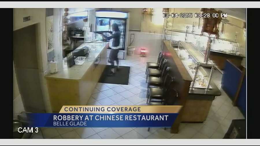 A man robs a Chinese restaurant in Belle Glade at gunpoint. Ari Hait reports.