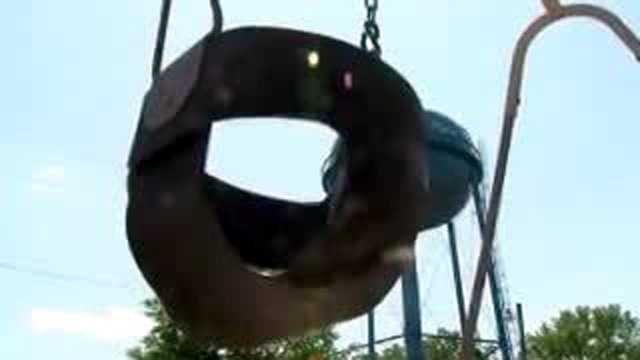 Woman found pushing dead toddler in swing