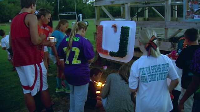Vigil held for youth football coach killed in crash