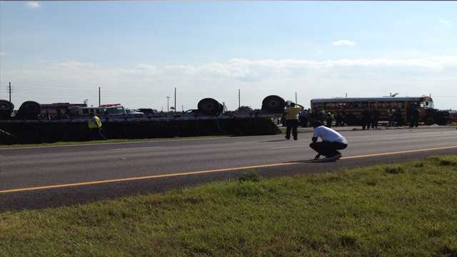 A school bus collided with a semi-truck in St. Lucie County late Monday afternoon. (Ari Hait/WPBF)