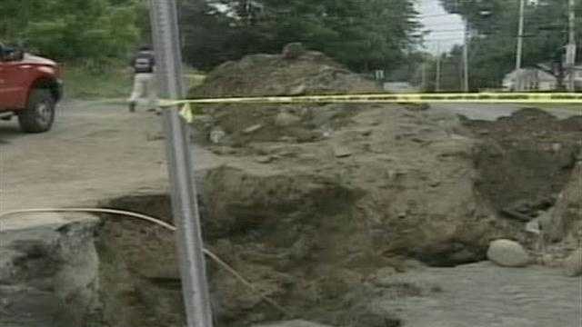 Two workers were buried up to their waists when the trench they were digging collapsed Tuesday morning.
