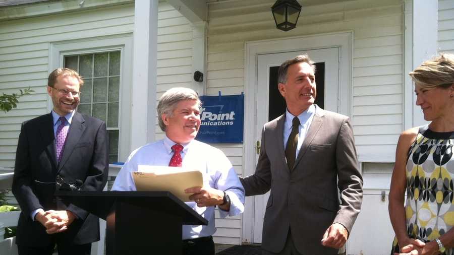 airpoint Vermont President Mike Smith, with Gov. Peter Shumlin and state telecom leaders, mark completion of broadband network expansion into remote areas of Lamoille County.