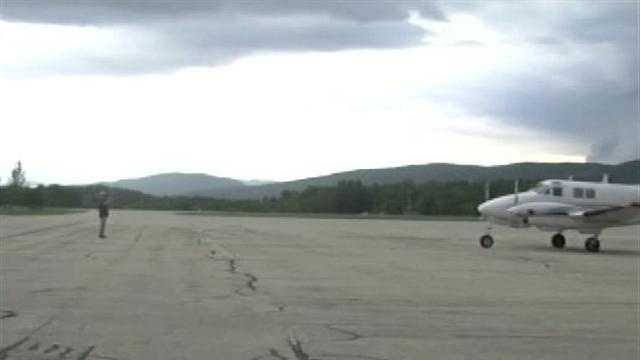 A plane from out-of-state lands at Rutland airport to be loaded with pesticides and spray thousands of acres of land for mosquitoes.