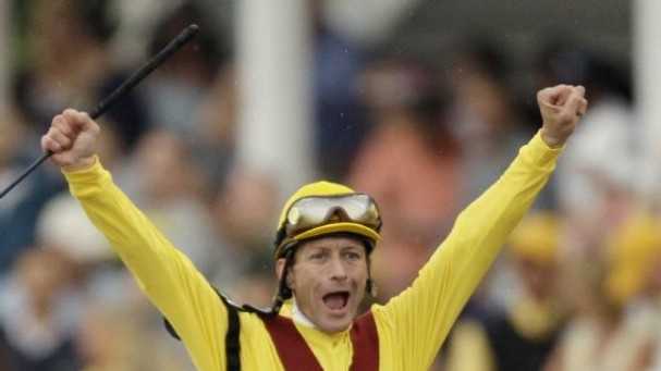 Jockey Calvin Borel celebrates in the irons after Rachel's impressive victory over Kentucky Derby winner Mine That Bird in the 2009 Preakness Stakes