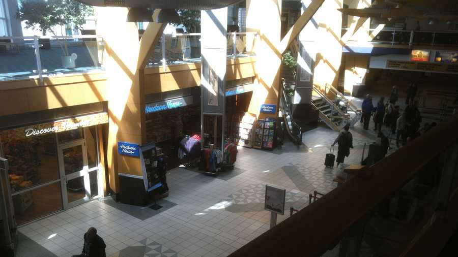 Passengers walk through the Burlington International Airport terminal.
