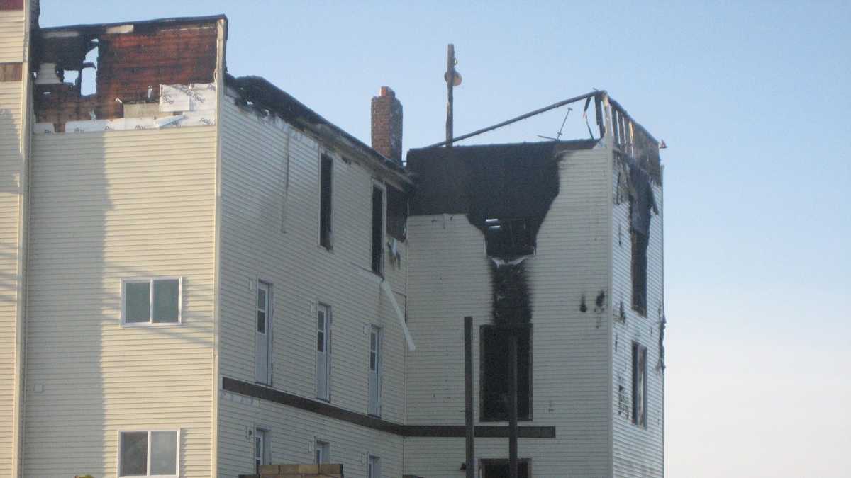 PHOTOS: Fire tears through apartment building