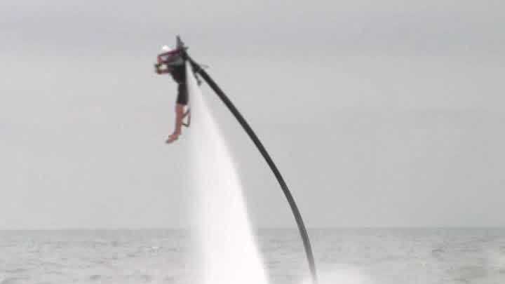 A new attraction at a South Carolina beach lets people fly above the ocean with a jetpack.