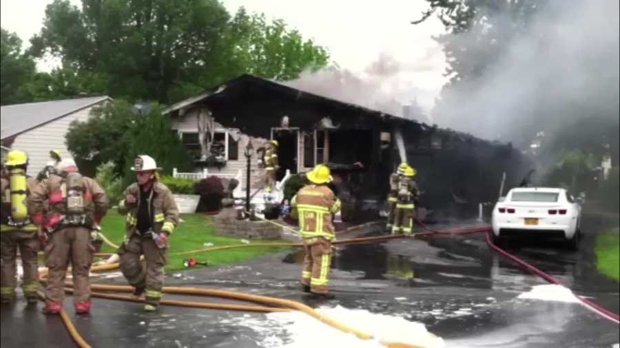 A fire leveled Rouses Point home and the attached garage Monday morning.