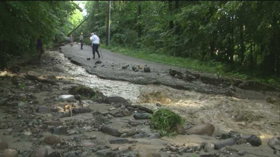 Flood waters overwhelmed roads in Chittenden County on Wednesday following another afternoon of downpours.