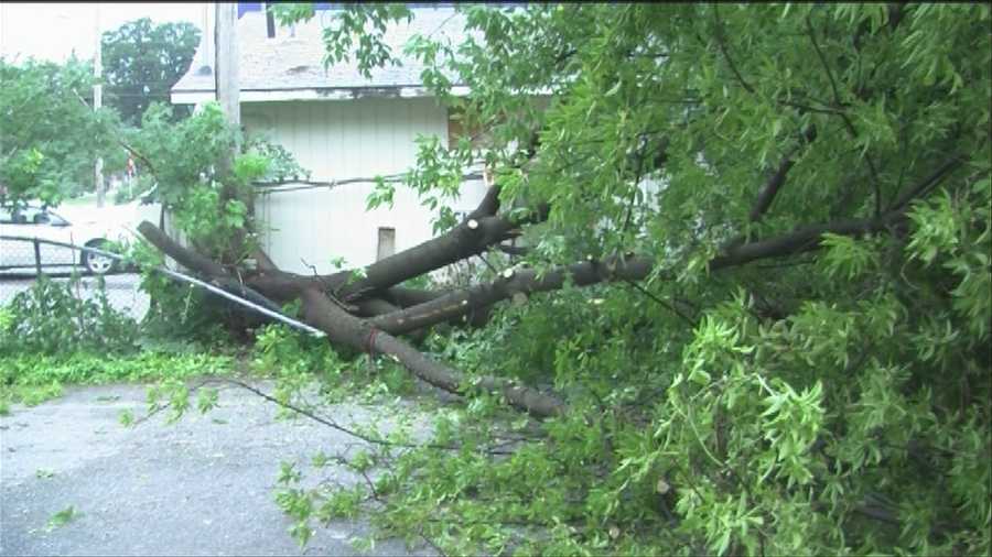 Downpours blew through Northern Vermont on Wednesday afternoon taking down trees and bringing down temperatures.