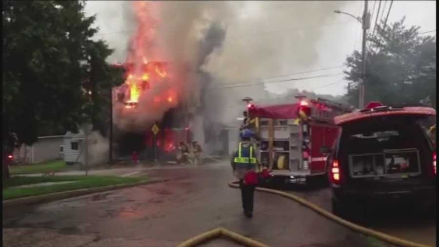 Structure collapses under flames