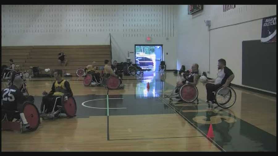 Overcoming serious injuries athletes in wheelchairs face off in rugby game