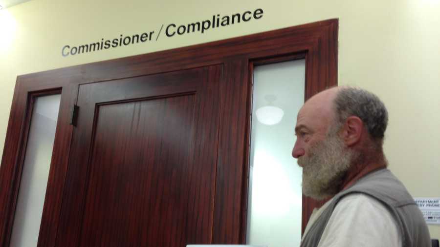 Karl Hammer, president of Vermont Compost Company, drops off his appeal at tax department, which has demanded he pay $115k in back taxes and penalties.