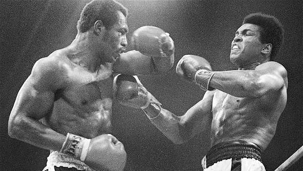 Ken Norton battles Muhammad Ali in the first of their three bouts. Norton won the first bout and broke Ali's jaw.