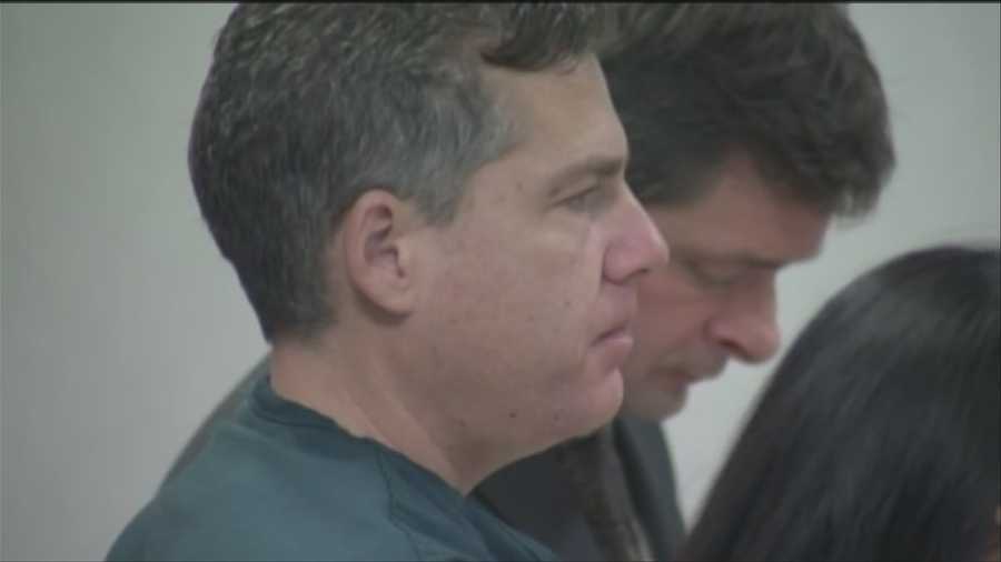A man accused of trying to kill his wife answers a new charge in court.