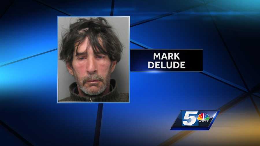 Mark Delude seen in an April 2014 booking photo.