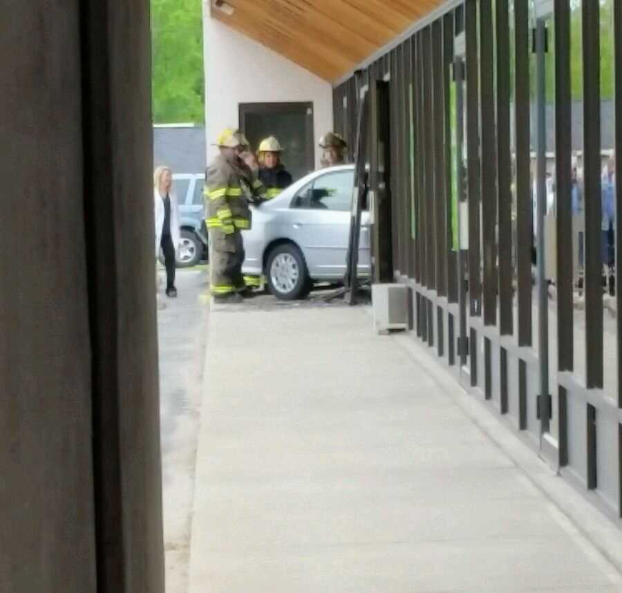 FROM THE SCENE Car crashes through building