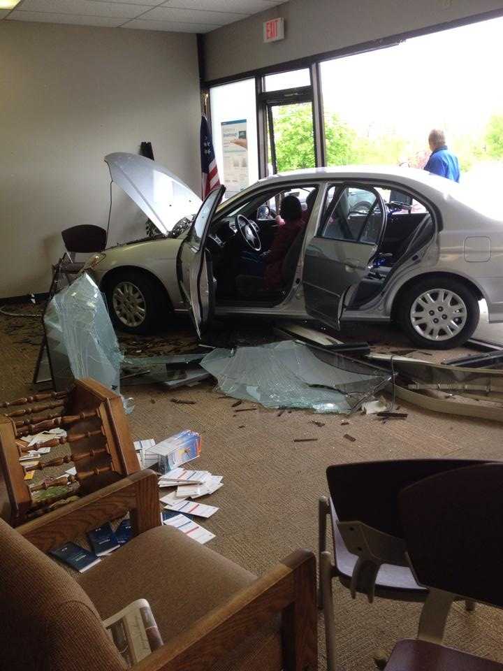 FROM THE SCENE Car crashes through building