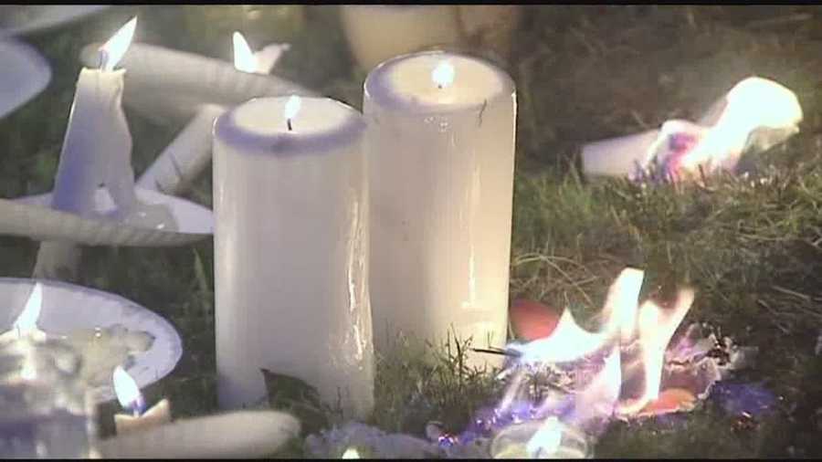 Friends and family hold candlelight vigil in Plattsburgh Friday