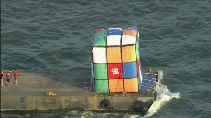 A giant replica of a world famous puzzle floated down the Hudson River in New York City on Friday morning.