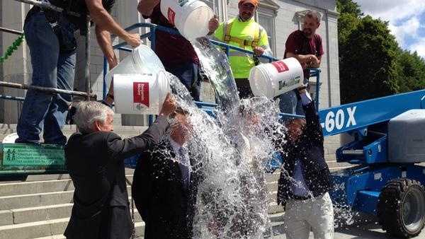 Vermont Governor Peter Shumlin and Lt. Governor Phil Scott take part in the ALS Ice Bucket Challenge. The duo were doused Barre Mayor Thom Lauzon, Montpelier Mayor John Hollar and a team of people working from a crane.