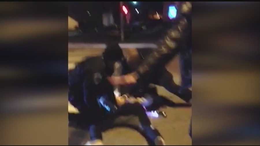 Officer appears to punch man in back during arrest
