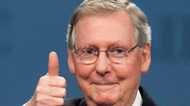 Senator Mitch McConnell gives the thumbs up in this Associated Press file photo.