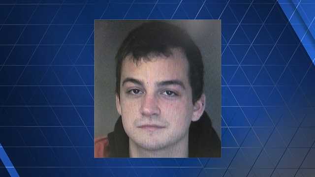 Man accused of stealing from police cruiser