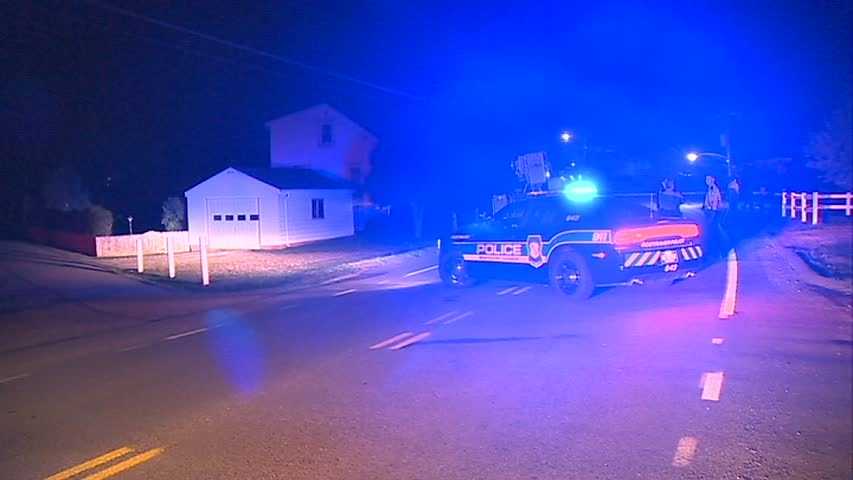 Car crashes into pole, splits in half