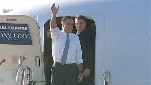 Republican presidential nominee Mitt Romney exits his plane at Pittsburgh International Airport on Election Day