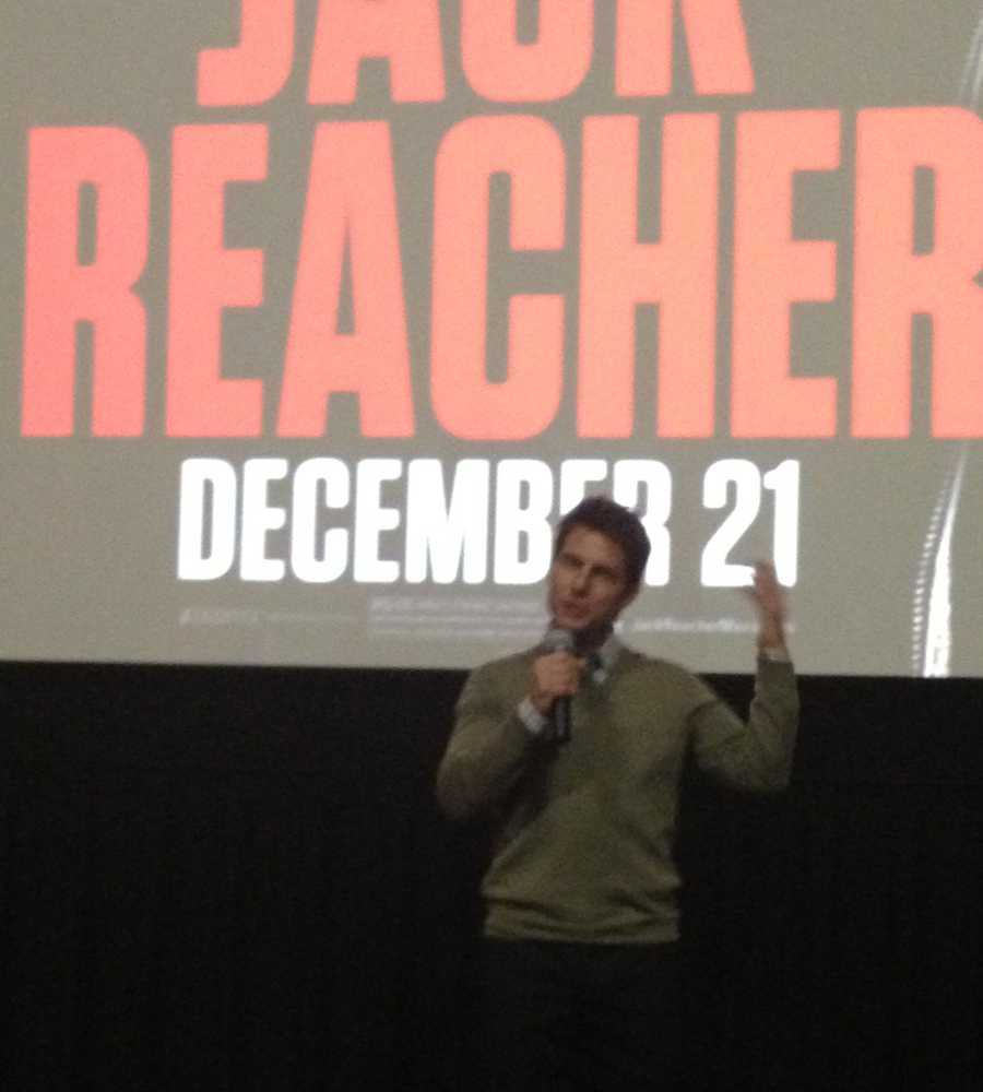 Tom Cruise is back for the rescheduled U.S. premiere of "Jack Reacher," but it has a scaled-down feel out of respect for families and victims of the shooting at Sandy Hook Elementary School.
