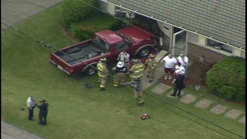 Photos: Pickup truck slams into Ross Township home