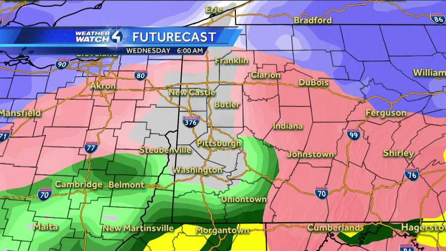 Wednesday 6 a.m. (White represents snow. The deeper the purple, the heavier the snowfall. Pink=ice/sleet/freezing rain. Green=rain. Yellow=heavy rain.)