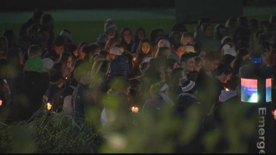 West Virginia University students gather at a vigil to remember Nolan Burch.